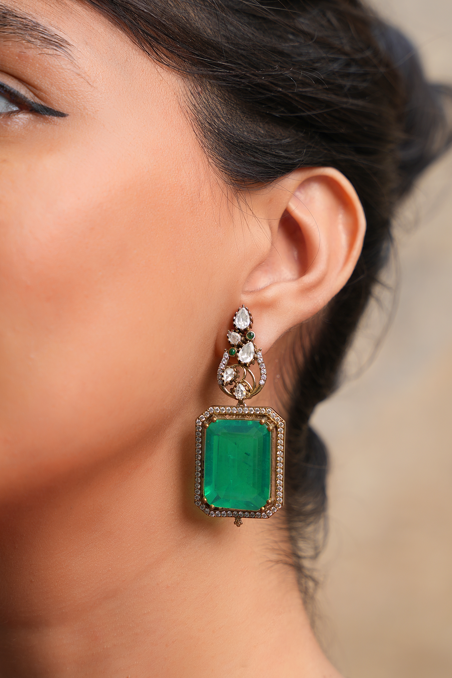 Gold Plated Kundan polki Danler with hanging Green stone