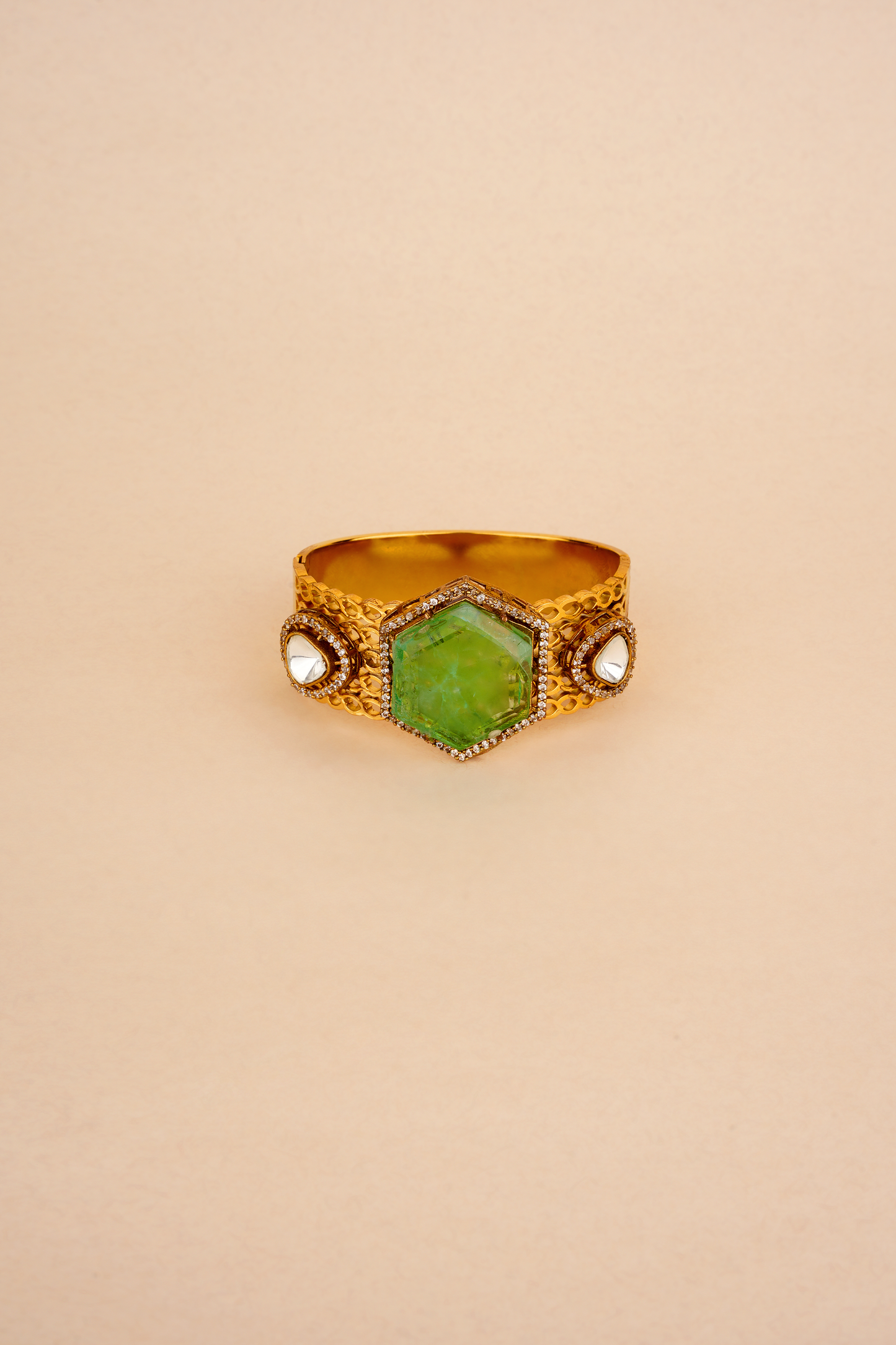 Gold Plated Bracelet with a Green stone & Polkis