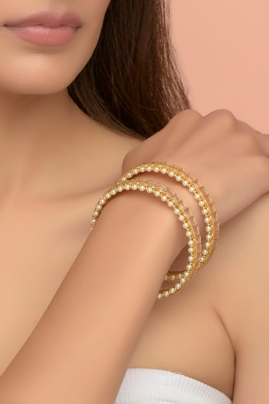 Gold Finish Studded pink stones &  Pearl Bangles