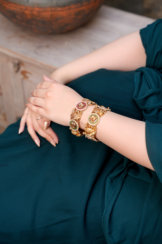 Gold Plated Bangles with Elephant Peacock motif with Red & Green stones