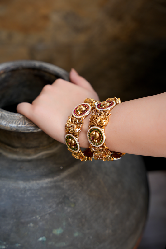 Gold Plated Bangles with Elephant Peacock motif with Red & Green stones